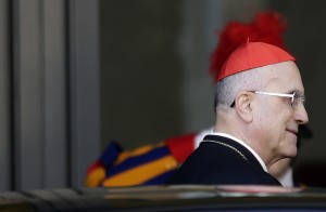 Italian Cardinal Bertone arrives for a meeting at the Synod Hall in the Vatican